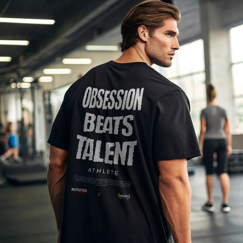 Camiseta oversize gym OBSESSION BEATS TALENT ATHLETE en underrated